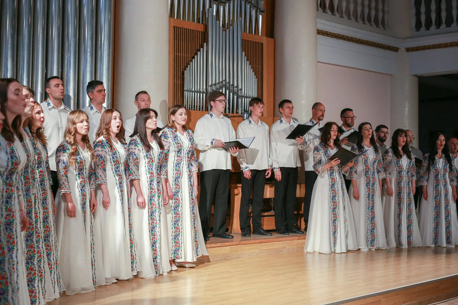 Community singers gathered on stage during an uplifting musical celebration